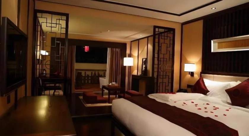 Bed in Xiang Yun Sha Garden Hotel
