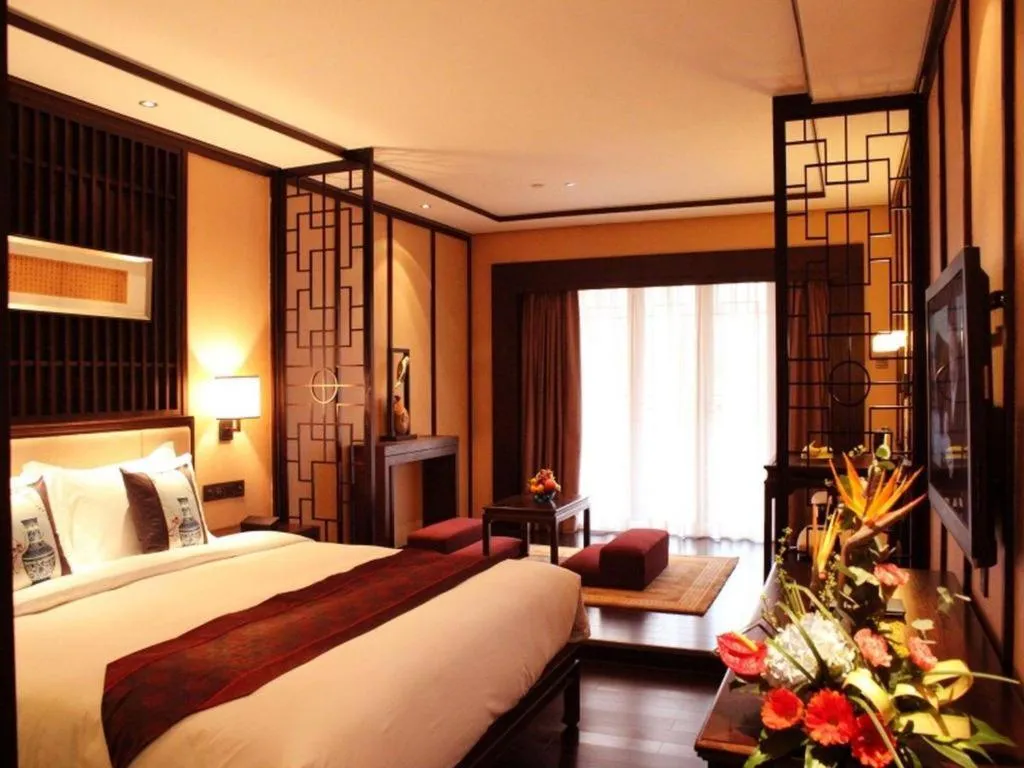 Bed in Xiang Yun Sha Garden Hotel
