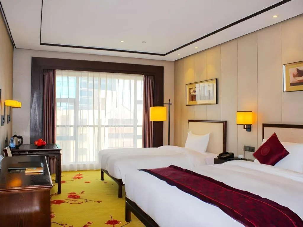 Bed in Xiang Yun Sha Garden Hotel