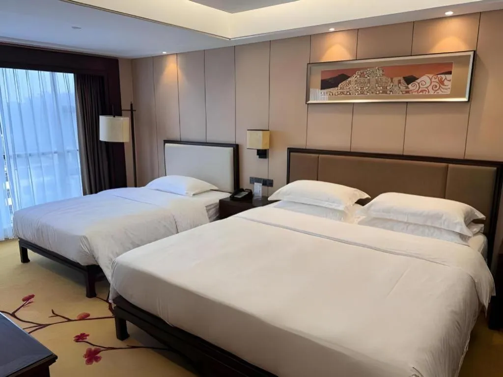 Bed in Xiang Yun Sha Garden Hotel