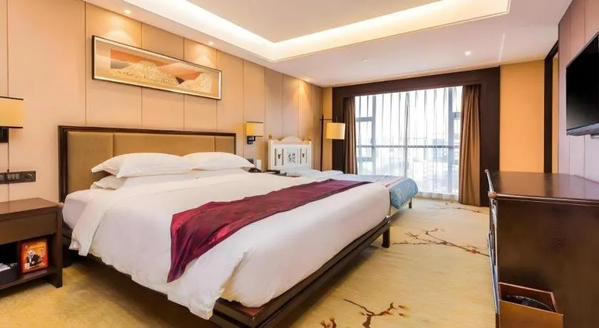 Bed in Xiang Yun Sha Garden Hotel