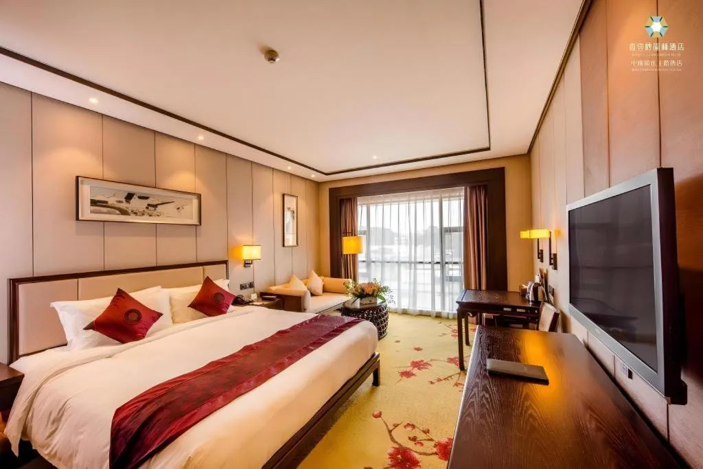 Bed in Xiang Yun Sha Garden Hotel