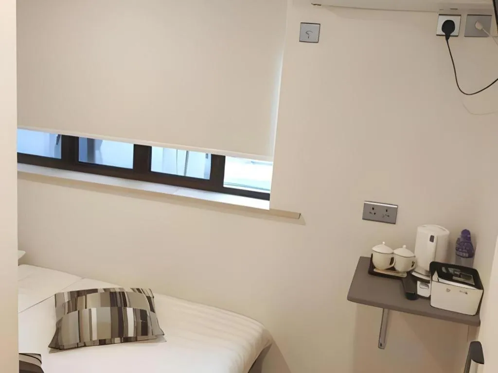 Bed in Goodrich Hotel