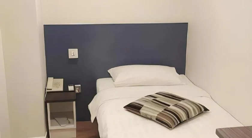 Bed in Goodrich Hotel