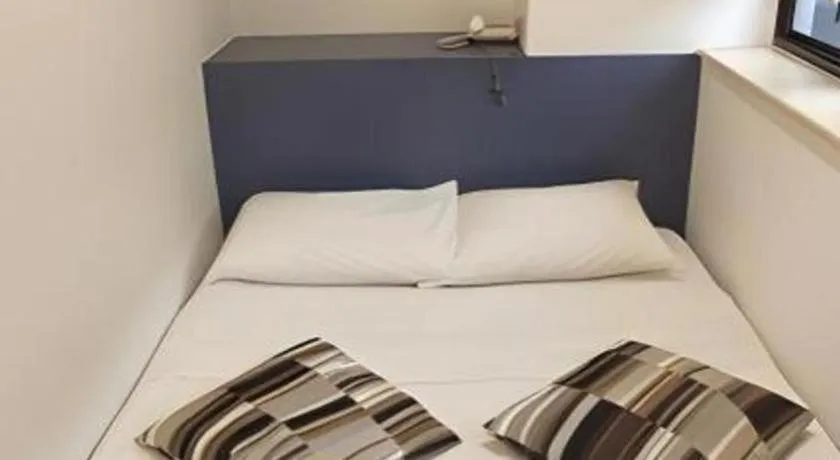 Bed in Goodrich Hotel