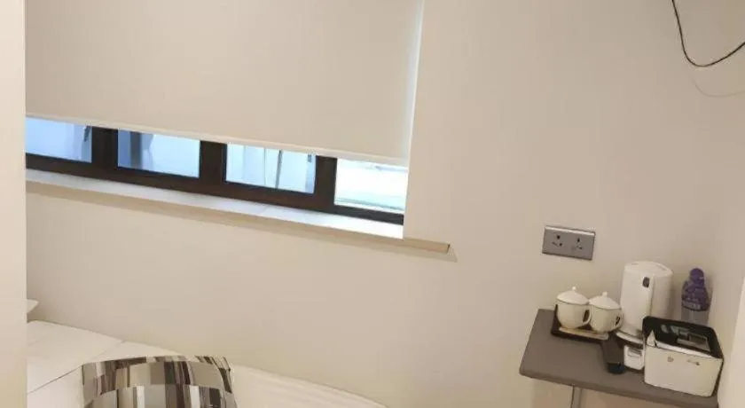 Bed in Goodrich Hotel