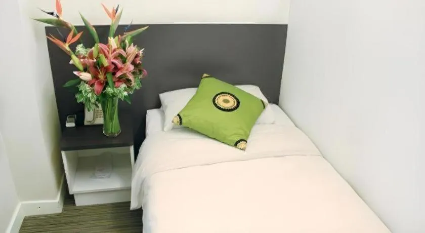 Bed in Goodrich Hotel