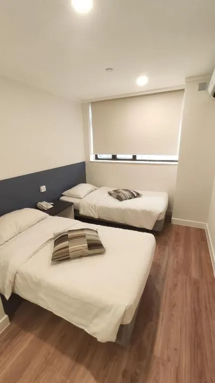 Bed in Goodrich Hotel