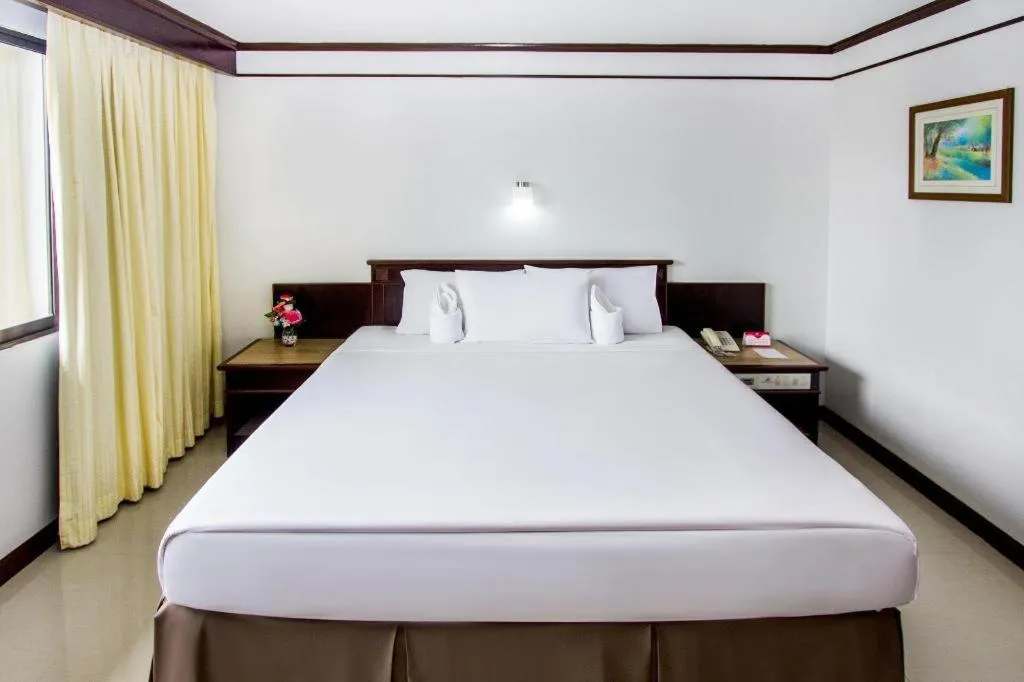 Bed in Hatyai Rama Hotel