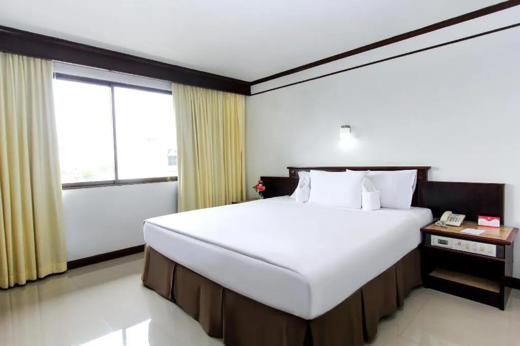 Bed in Hatyai Rama Hotel