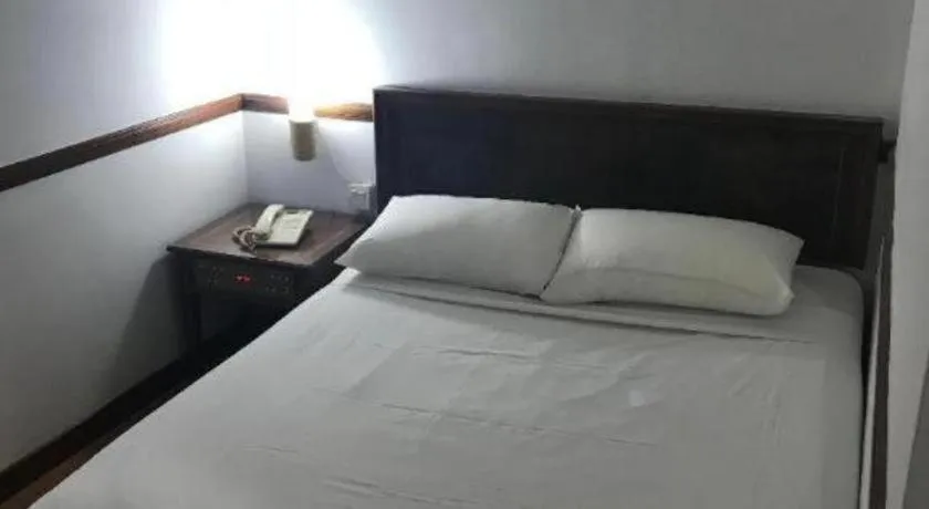 Bed in Four Chain View Hotel