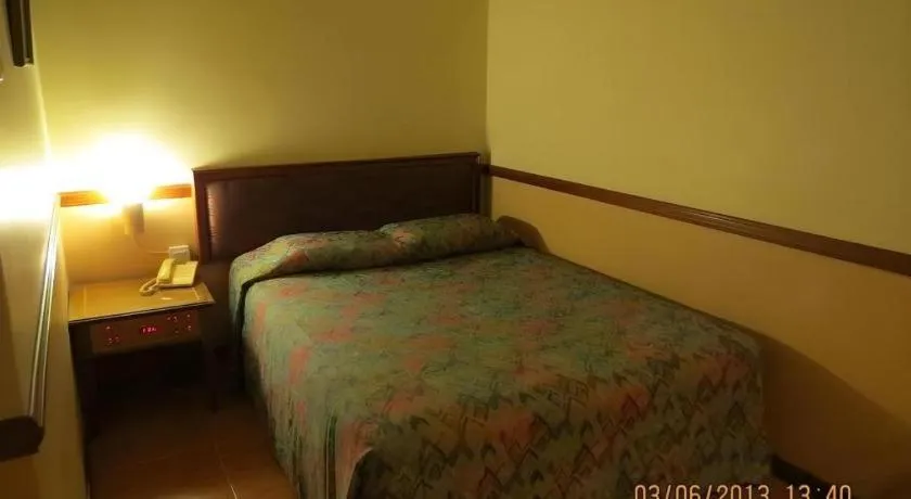 Bed in Four Chain View Hotel