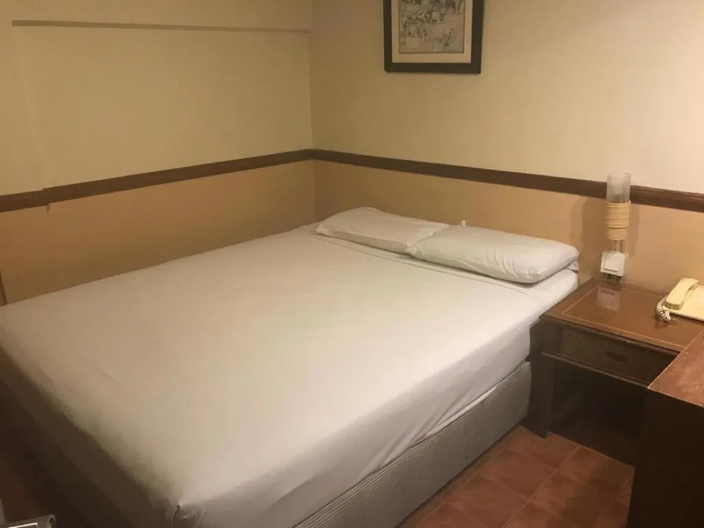 Bed in Four Chain View Hotel