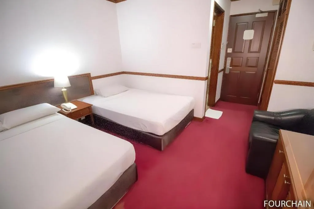 Bed in Four Chain View Hotel