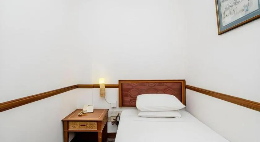 Bed in Four Chain View Hotel