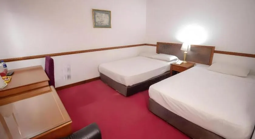 Bed in Four Chain View Hotel