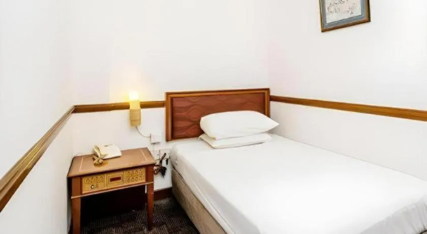 Bed in Four Chain View Hotel