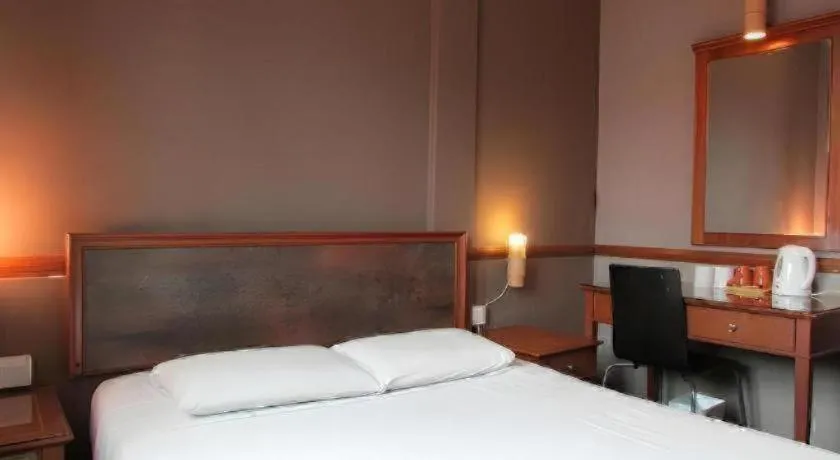 Bed in Four Chain View Hotel