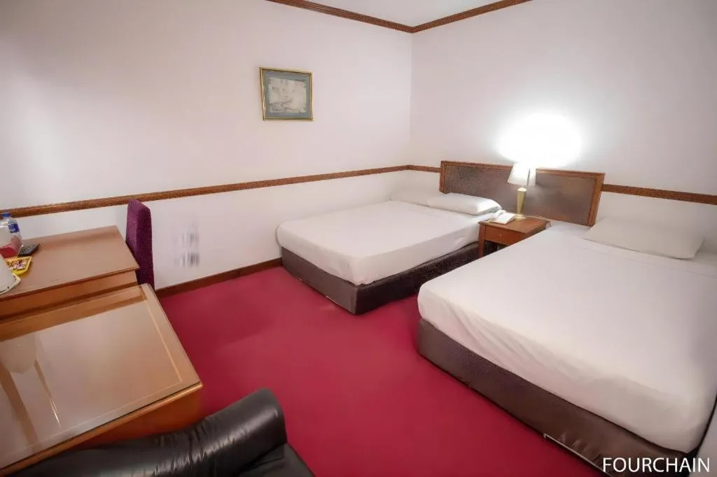 Bed in Four Chain View Hotel