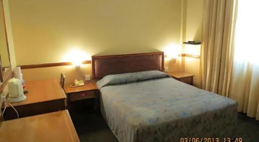 Bed in Four Chain View Hotel