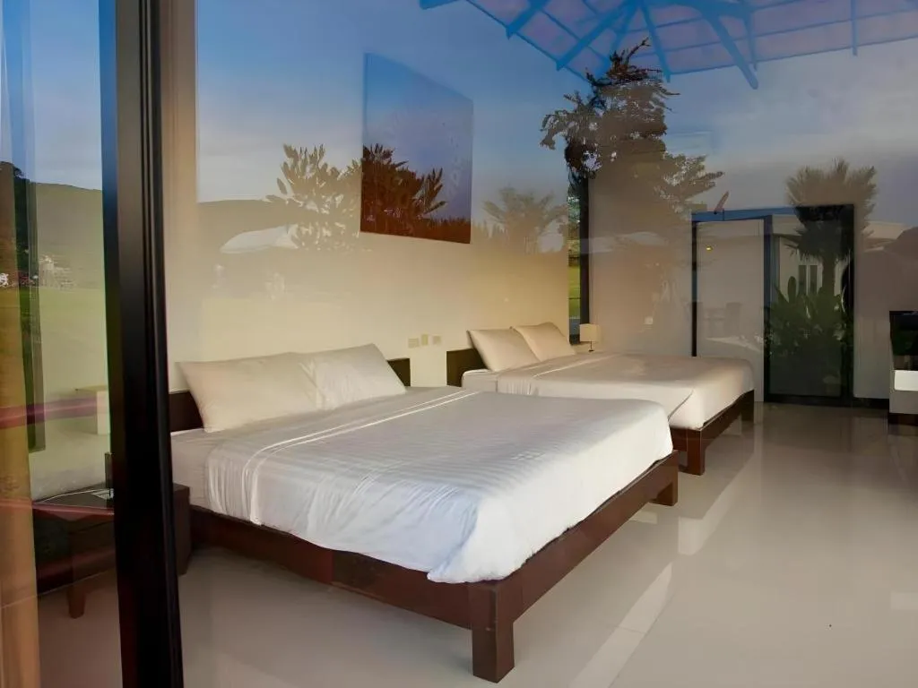 Bed in Chantara Valley Resort