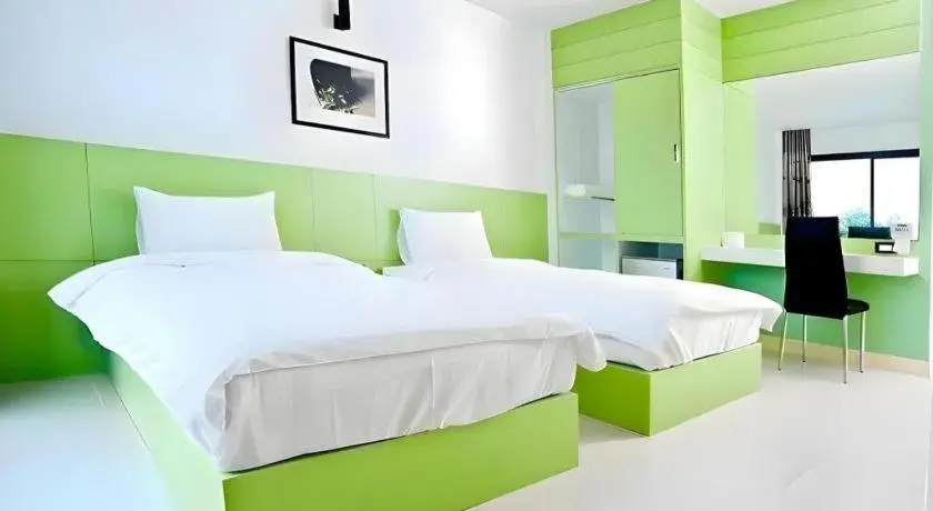 Bed in Siamgrand Hotel Bed in Siamgrand Hotel