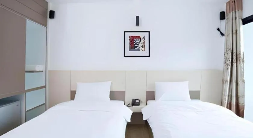 Bed in Siamgrand Hotel