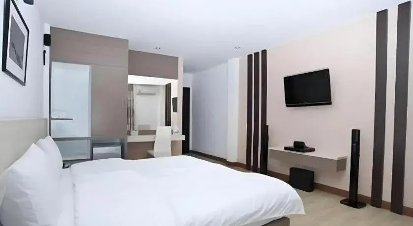 Bed in Siamgrand Hotel Bed in Siamgrand Hotel