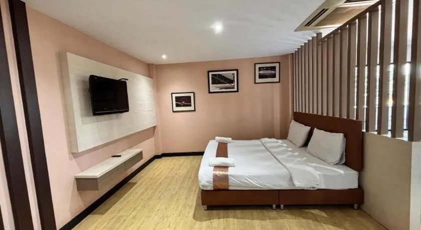 Bed in Siamgrand Hotel