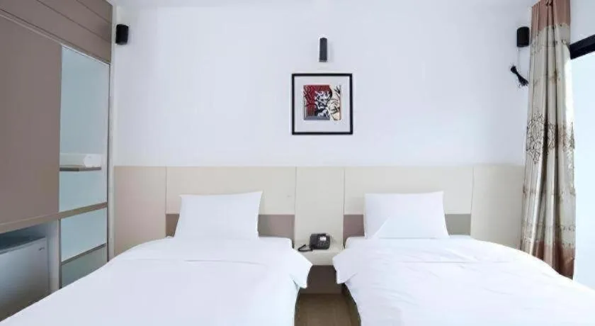 Bed in Siamgrand Hotel