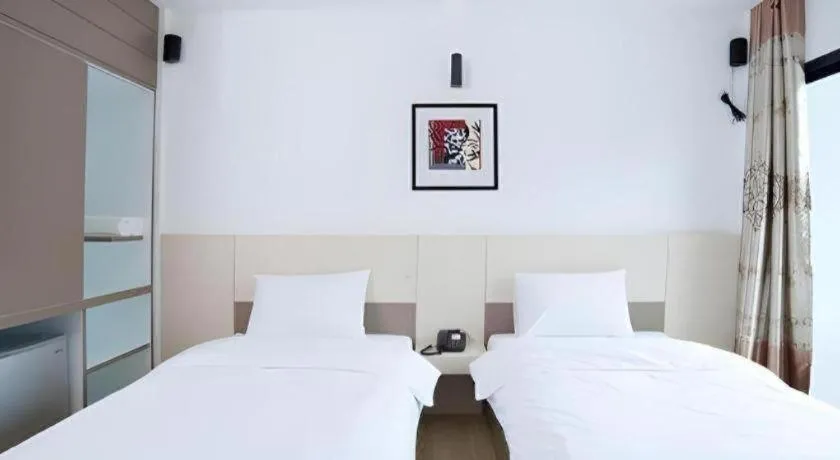 Bed in Siamgrand Hotel