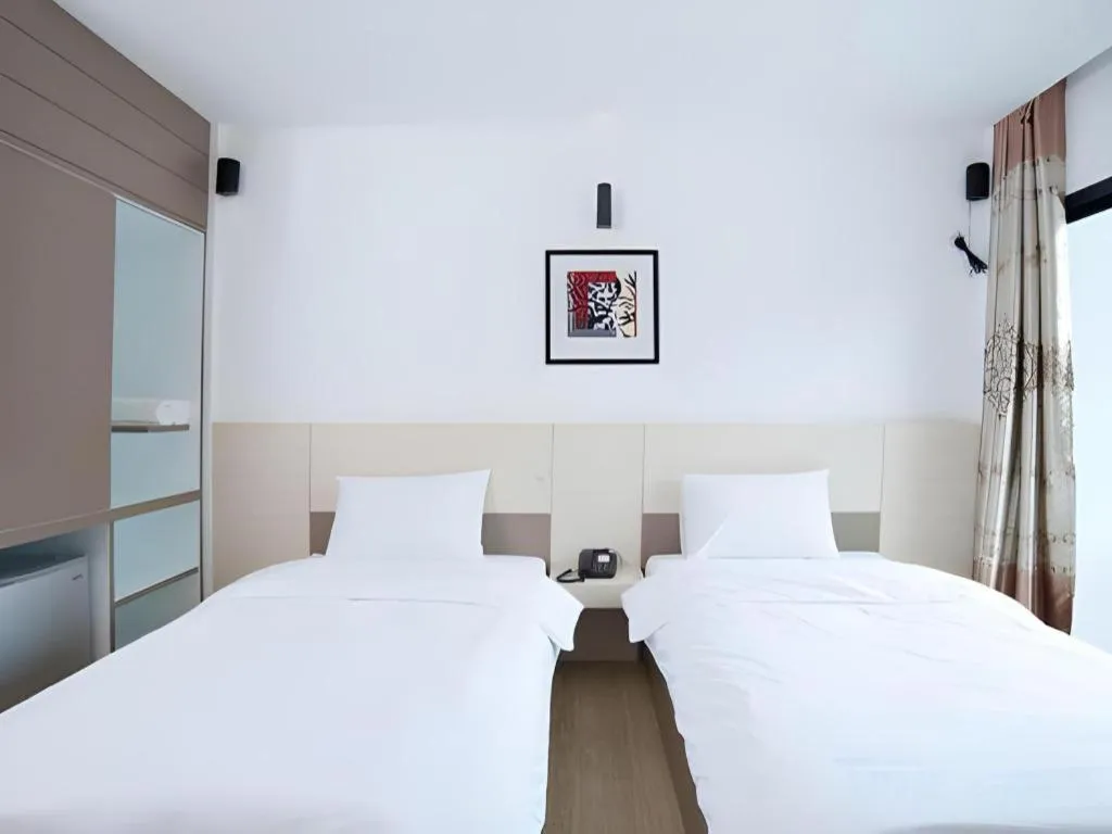 Bed in Siamgrand Hotel