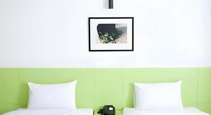 Bed in Siamgrand Hotel Bed in Siamgrand Hotel