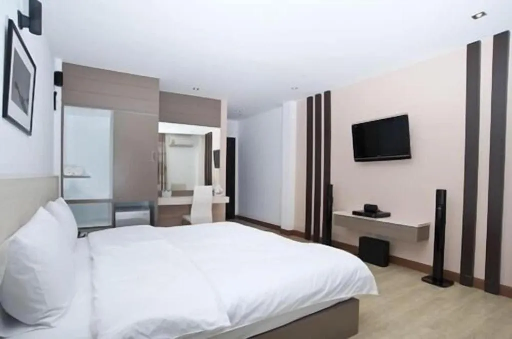 Bed in Siamgrand Hotel