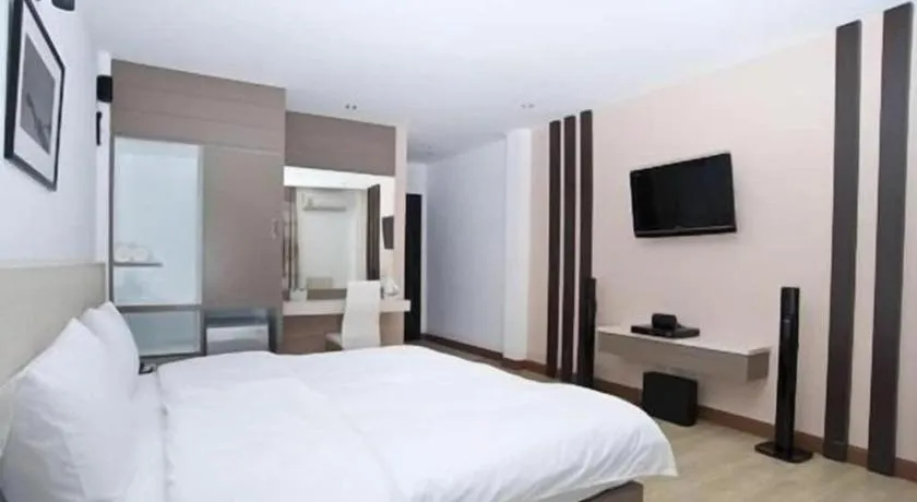 Bed in Siamgrand Hotel