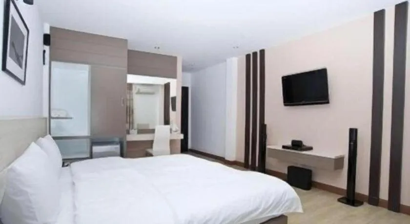 Bed in Siamgrand Hotel