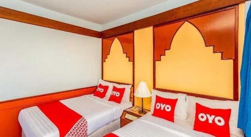 Bed in OYO 441 Grand Thara Hotel
