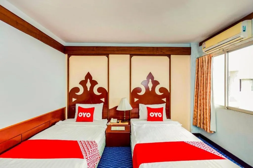Bed in OYO 441 Grand Thara Hotel
