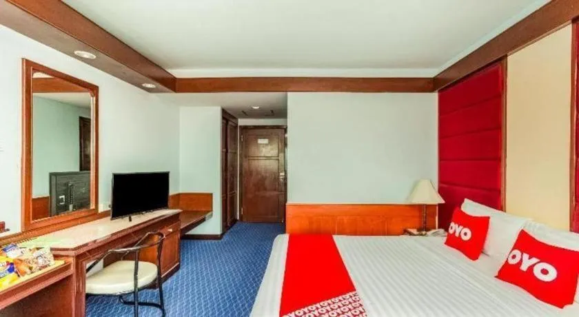 Bed in OYO 441 Grand Thara Hotel