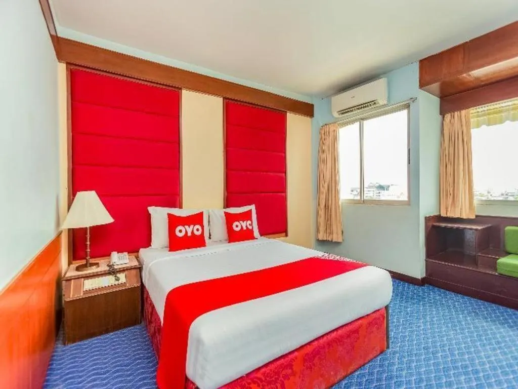 Bed in OYO 441 Grand Thara Hotel