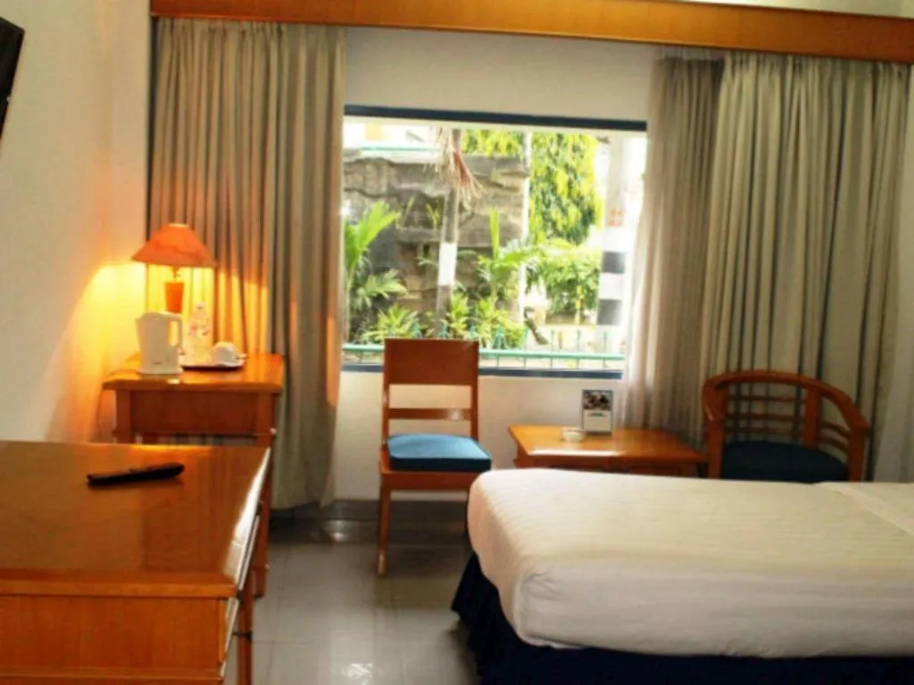 Bed in Hotel Marcopolo