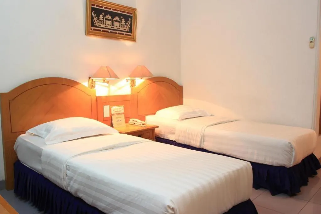 Bed in Hotel Marcopolo