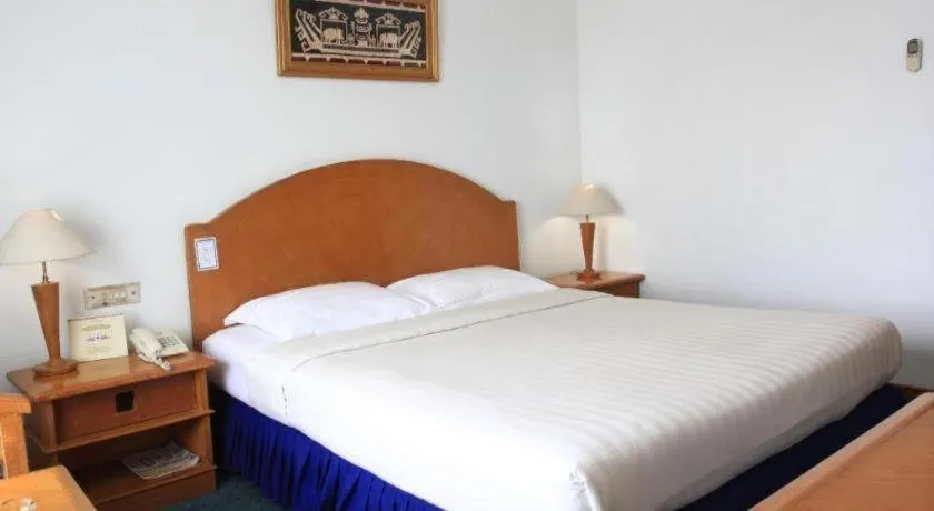 Bed in Hotel Marcopolo