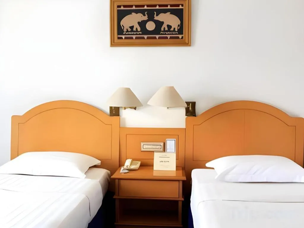 Bed in Hotel Marcopolo