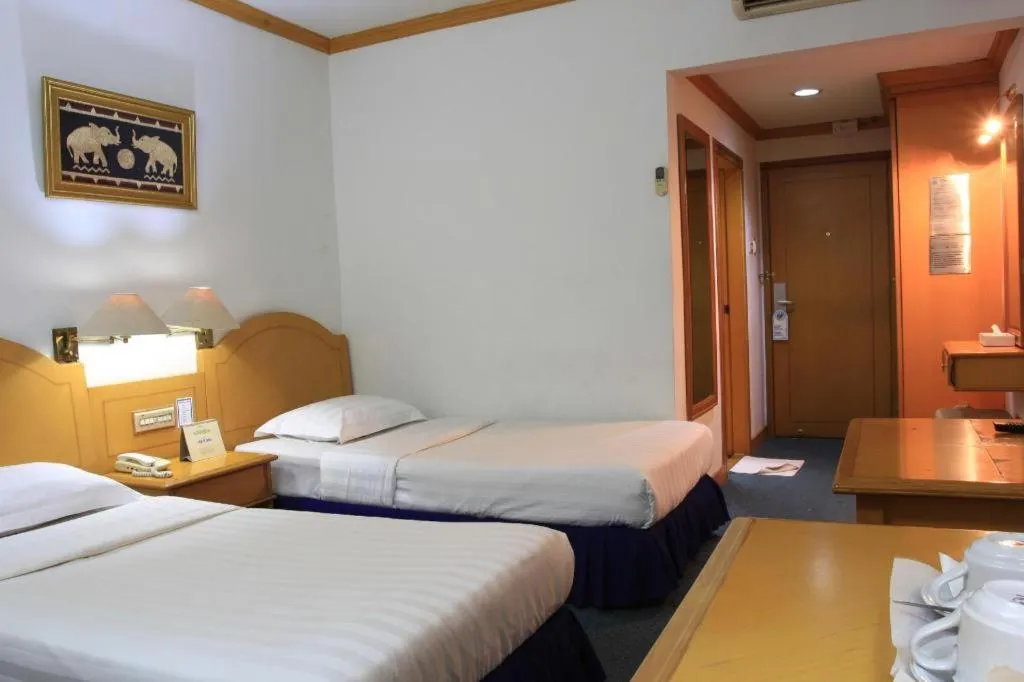 Bed in Hotel Marcopolo