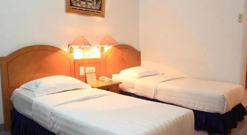 Bed in Hotel Marcopolo