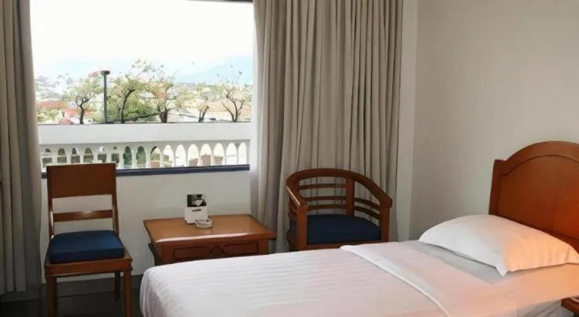 Bed in Hotel Marcopolo