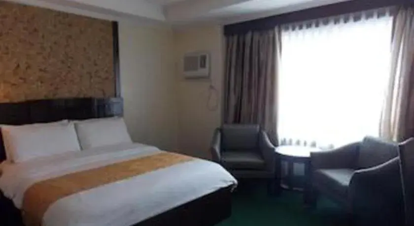 Bed in MO2 Westown Hotel San Juan Bed in MO2 Westown Hotel San Juan