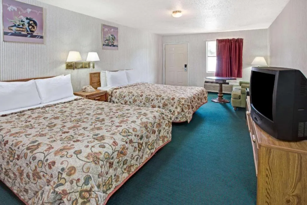 Bed in Knights Inn South Houston TX