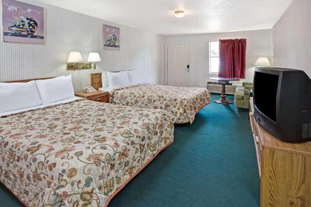 Bed in Knights Inn South Houston TX